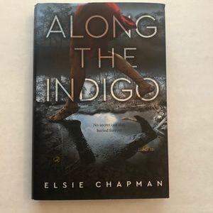 Along The Indigo by Elsie Chapman Hardcover Book
